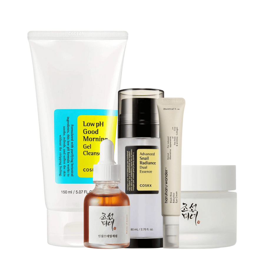 Ett urval av K-Beauty Mature Skin Time Revers Kit för ålderstecken på vit bakgrund.