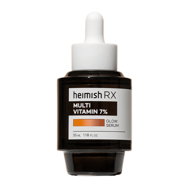 Heimish RX Multi Vitamin 7% Glow Serum i en mörk glasflaska med pipettlock, designad för att ge lyster och näring till huden.